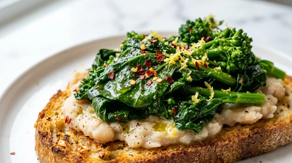Close-Up of Creamy White Beans and Broccoli Rabe on Toast
